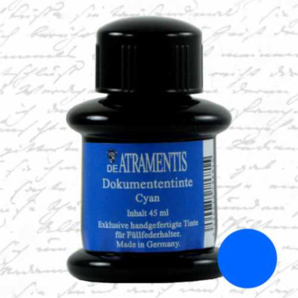 A small black bottle of De Atramentis Cyan document ink with a blue label, shown against a white background with faint cursive writing and a blue color circle overlay.