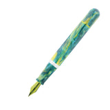 Fountain pen with a green and yellow marbled design on a white background