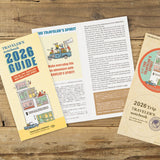 Traveler's Company 2026 Guide and notebook on a wooden surface