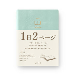 Light turquoise blue notebook with beige cover band featuring text and a logo on a white background