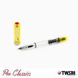 4 TWSBI Eco Transparent Yellow Fountain Pen Uncapped next to Cap